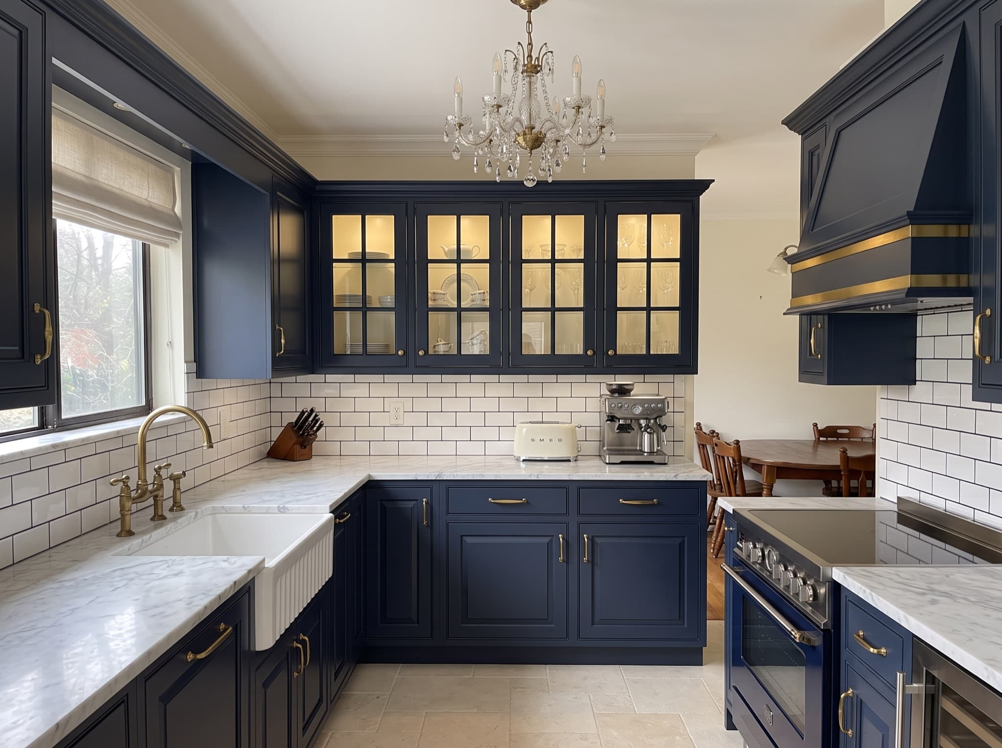 AI kitchen cabinet design comparison: golden oak cabinets from the nineties become navy shaker with brass pulls — after, AI kitchen design result